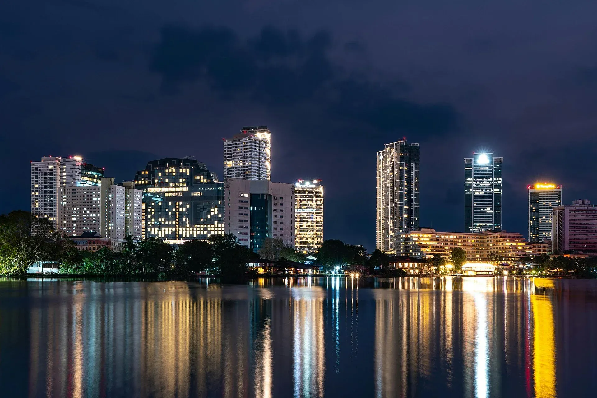 Colombo skyline reflected in water after dark