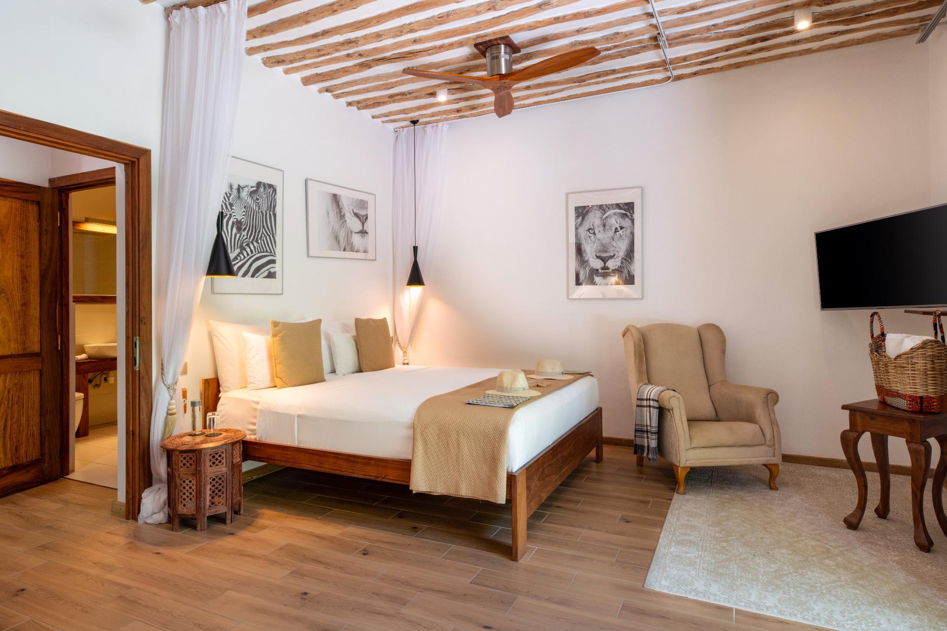 Cinnamon Quadruple Room at Zanzibar White Sand Luxury Villas and Spa