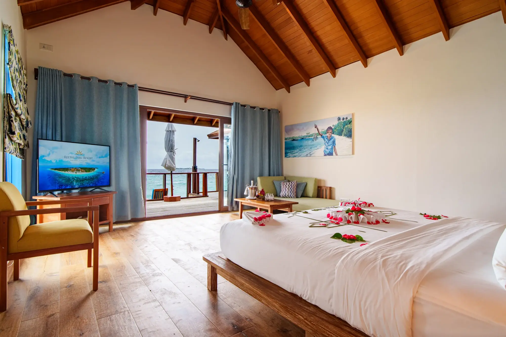 Two-Bedroom Water Villa Suite with Spa Tub at Reethi Faru Resort, view 1