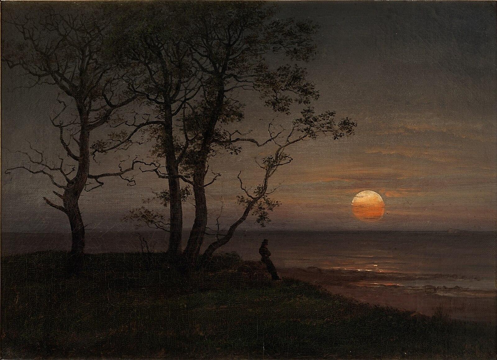 A meditative figure seated by a moonlit shore — Johan Christian Dahl